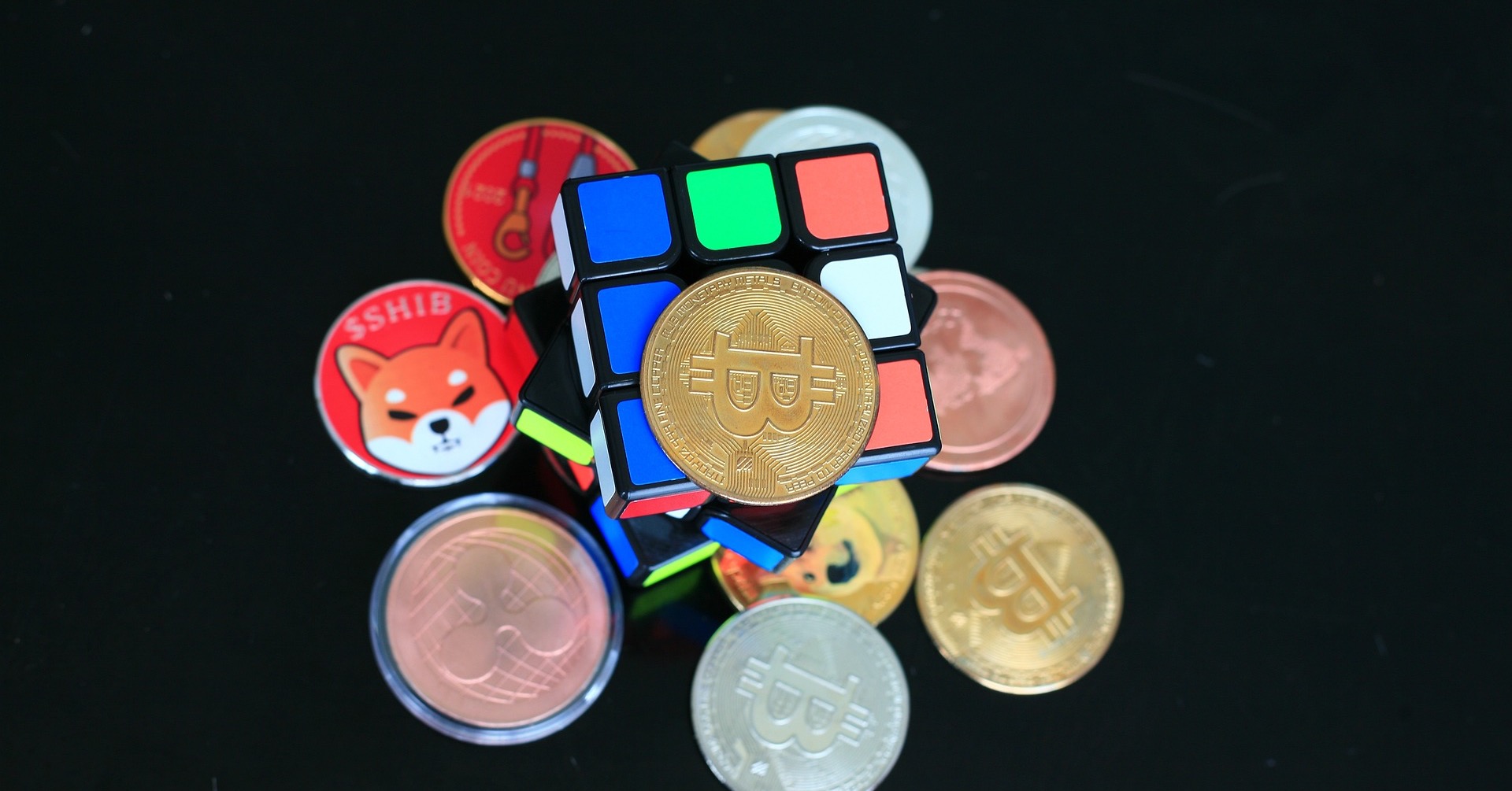 image of various crypto and Rubik's cube